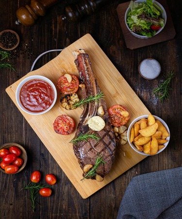 Grilled Ribeye Steak at De Flambe, Elysium Tower, Blue Area, Islamabad. A perfectly seared, tender ribeye steak, cooked to your preference and served with savory sides. The ideal choice for steak lovers in F7, F8, G7, and G8 areas of Islamabad.
