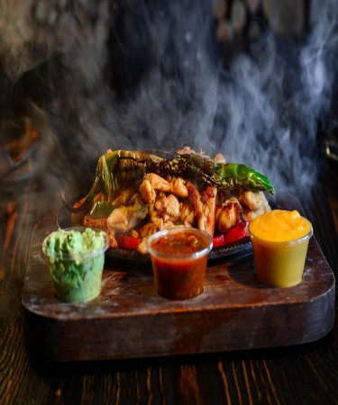 Jalapeno Grilled Chicken at De Flambe, a top-rated restaurant in Islamabad near Centaurus and PIMS Hospital. Enjoy tender grilled chicken with a zesty kick from jalapenos, perfectly seasoned and grilled for spice lovers.